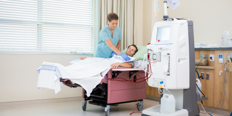 Modern dialysis machine with patient and nurse in a high-tech hospital setting